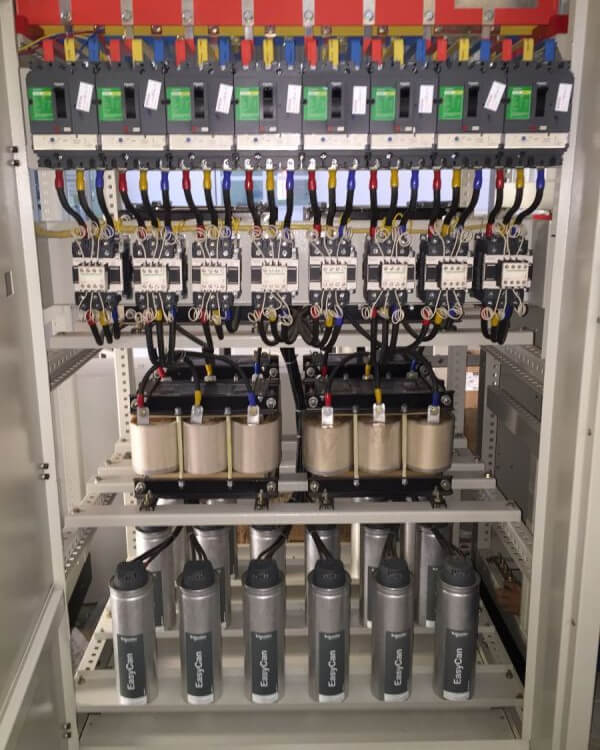Compensating capacitor cabinets